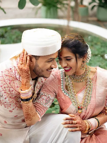 The pure joy of a wedding day captured between a couple. Our venue offers countless beautiful backdrops like this one, with natural light filtering through the trees for truly special moments.