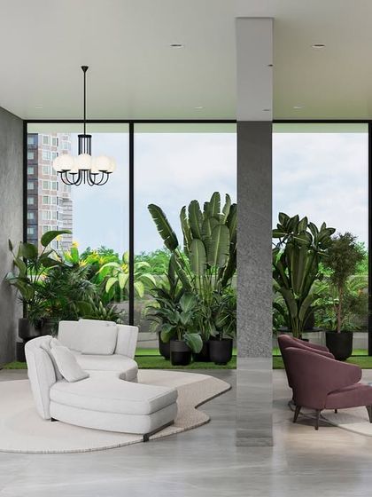 Cozy and relaxed. This lounge area uses a natural material palette and rich textures to tie the whole narrative together. The large windows bring the lush greenery from outside into the serene indoor space.