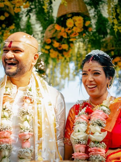 I have had the honor of hosting many beautiful South Indian weddings. The lush greenery and traditional decor elements, like floral arrangements and brass lamps, create an authentic and sacred atmosphere for the ceremony.