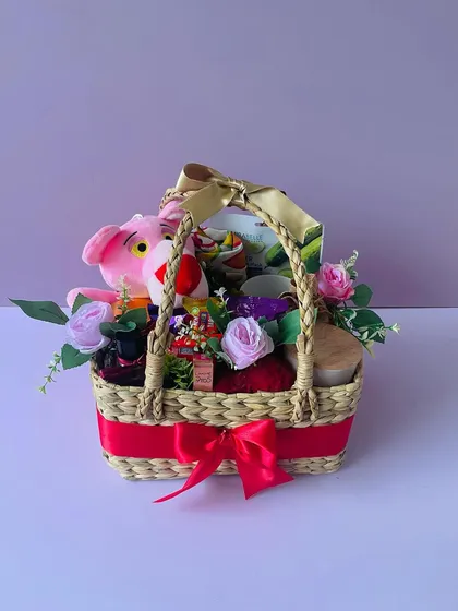 The vibrant colors and fun items make this Kauna basket a perfect birthday surprise for someone special.