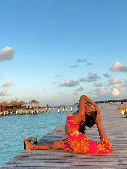 Another pose from the Maldives, this time a variation of Hanumanasana (the splits) with a backbend.