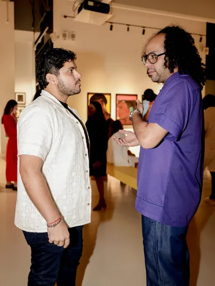 A shot of me in conversation at the Warhol exhibition. These events are also important networking opportunities, connecting with artists and cultural figures from around the world.