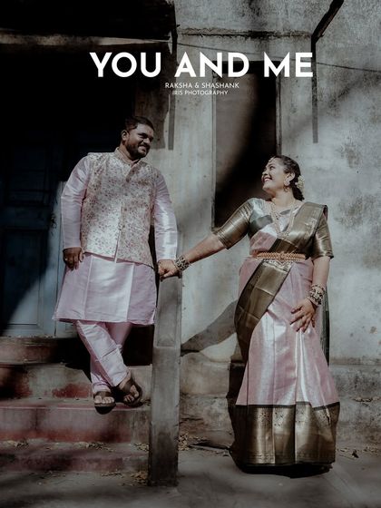 A sweet, posed moment from the same couple's engagement shoot, capturing their connection against a rustic, urban backdrop.