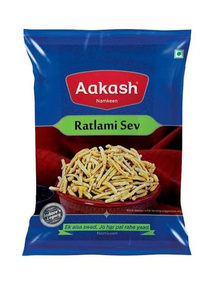 A packet of authentic Ratlami Sev from Aakash Namkeen, a specialty of Indore. This sev is known for its signature spicy flavour and crispy texture.