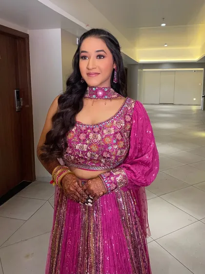 A pretty pink look for Kritika's Myra event. The makeup is soft and glamorous, with a focus on glowing skin and defined eyes.
