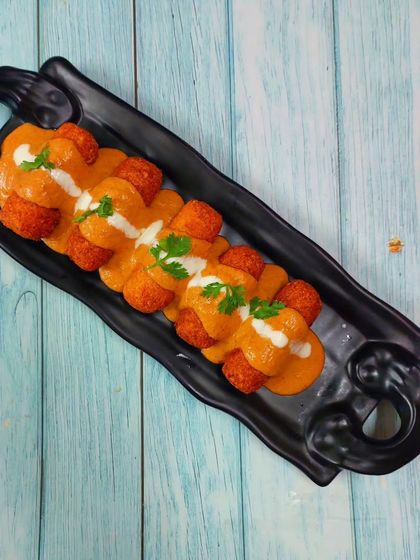 A beautifully plated Malai Kofta Curry. Learn to make soft koftas and a luscious, creamy gravy in my North Indian cuisine class.