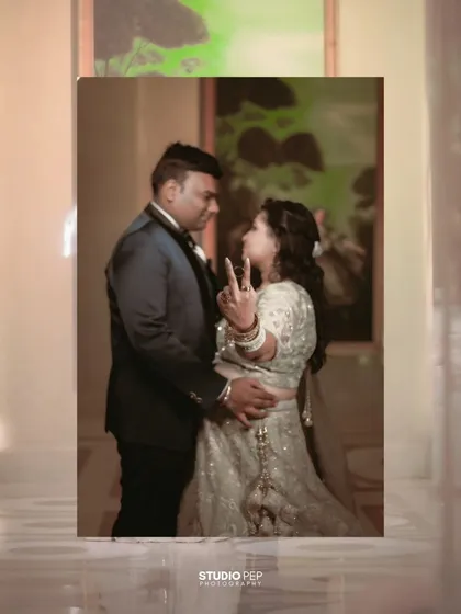 A playful, candid moment where the bride, Shalini, shows off her ring with a fun gesture, capturing the couple's joyful dynamic.