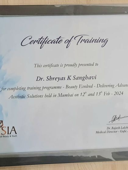 This certificate is for completing an advanced training program in aesthetic solutions called 'Beauty Evolved'. It's important for me to master new techniques to deliver superior results for my patients.