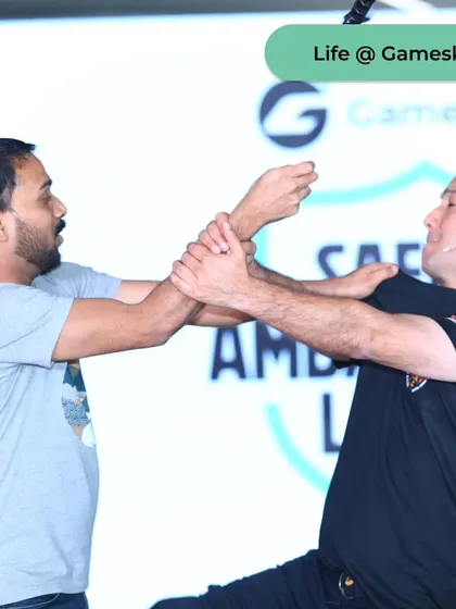 A wrist control and takedown demonstration at the Gameskraft personal safety session.