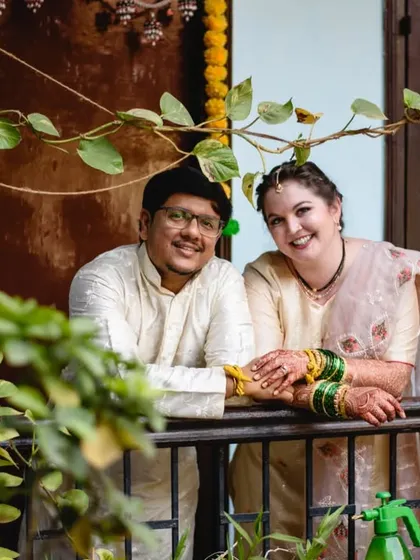 A lovely portrait of the couple in the courtyard of the wada. The mix of traditional architecture and lush greenery makes for a unique and beautiful photo location.