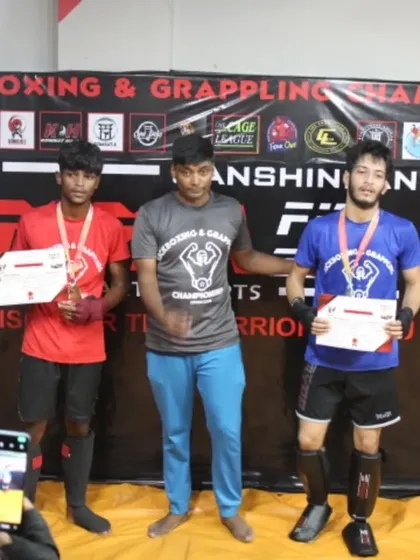 A candid shot of our fighters receiving their awards at the MFC Series 2.