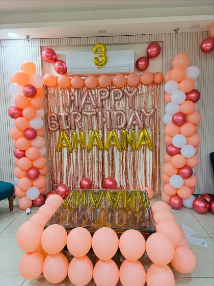 A full shot of the elegant 3rd birthday party setup.