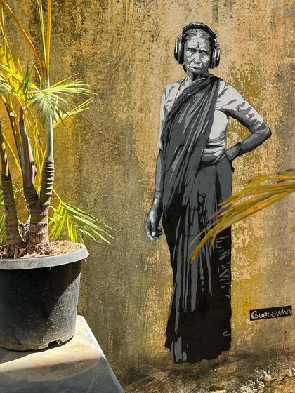 We were thrilled to discover this graffiti piece by the anonymous street artist 'Guesswho' on our wall one morning. It adds to the unique, artistic character of our front yard.