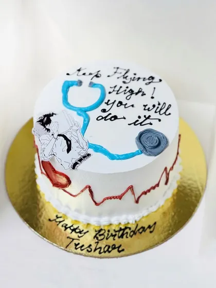 A motivational cake for a student preparing for the NEET exam.