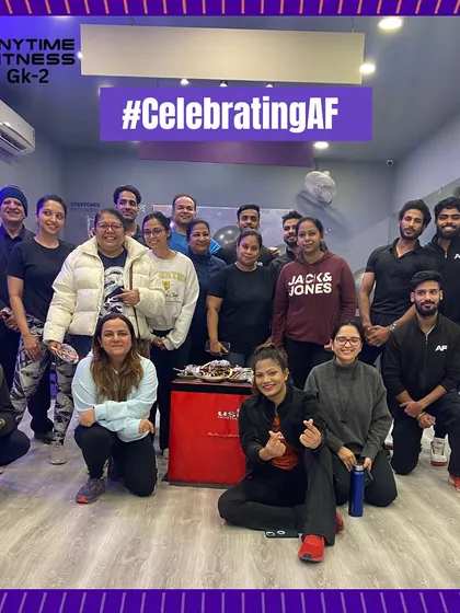 The whole crew celebrating 50 branches of Anytime Fitness in Delhi.