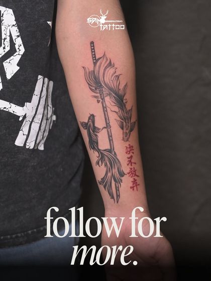 A custom forearm piece for an Aquarius, featuring two koi fish swimming around a katana, symbolizing flow, strength, and balance.