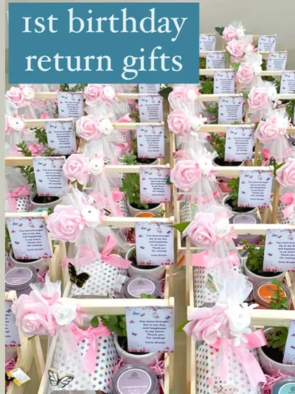A full display of the butterfly-themed first birthday return gifts, creating a beautiful and vibrant collection of party favors.