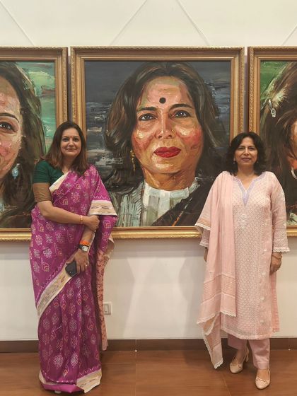 Another picture in front of the powerful portrait. The artist truly captured the spirit of my work. Knowledge is power.