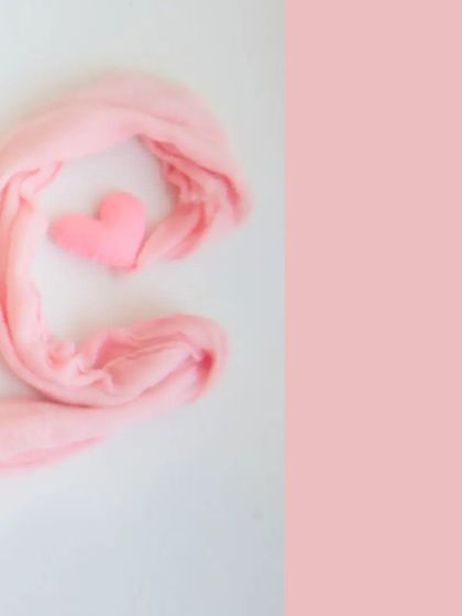 A creative flat-lay shot where the fabric is shaped into the letter 'C' for 'cute'. It's a fun and artistic way to add a personal touch to your gallery.