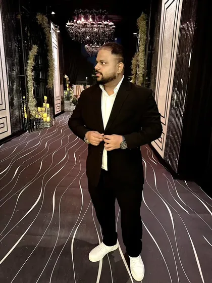 A final shot from a wedding night, buttoning up the suit. It reflects my commitment to professionalism and style at every client's special event.