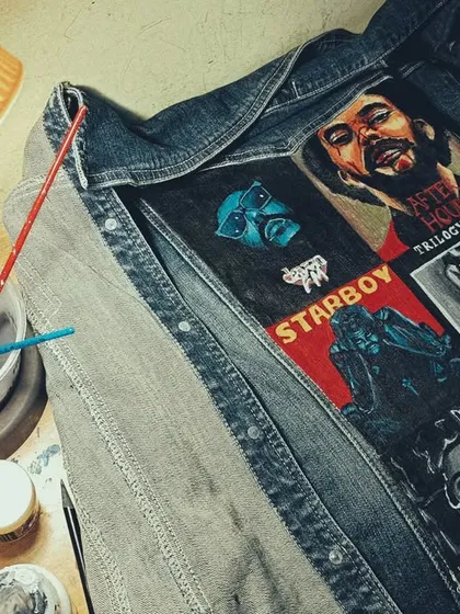 A behind-the-scenes shot of The Weeknd jacket in progress. Here you can see my workspace with my paints and brushes, right in the middle of bringing the album art to life.