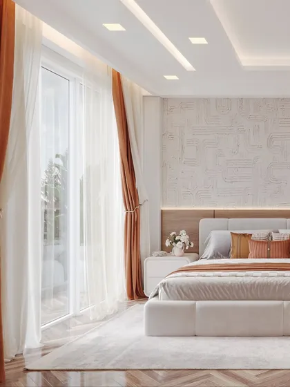 This shot captures the morning light streaming into the bedroom, highlighting the soft textures of the rug and bedding.