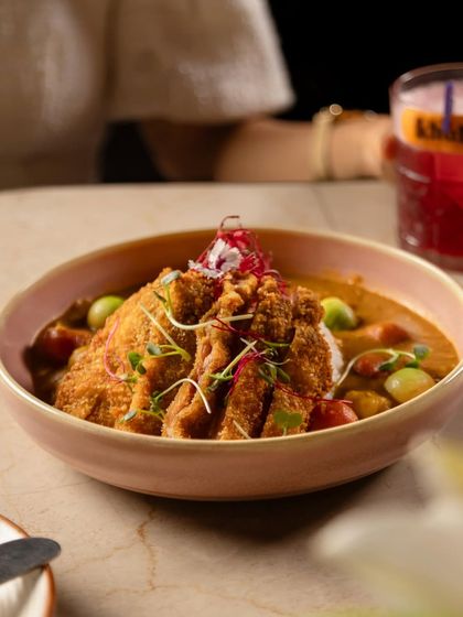 Embracing the art of grilling with our Yakitori Chicken Poke Bowl. This dish is a symphony of taste and texture, combining smoky grilled chicken with fresh vegetables and rice.