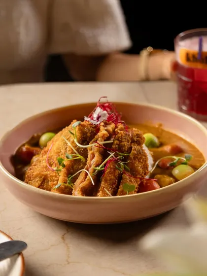 Embracing the art of grilling with our Yakitori Chicken Poke Bowl. This dish is a symphony of taste and texture, combining smoky grilled chicken with fresh vegetables and rice.