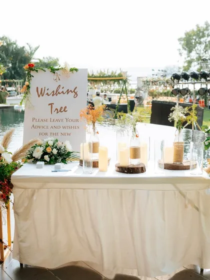The complete wishing tree station, elegantly set up for guests to engage with and share their love for the couple.