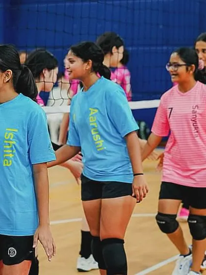 Lining up before the match, focused and ready. The pre-game handshake is a tradition that sets the tone for a respectful competition.