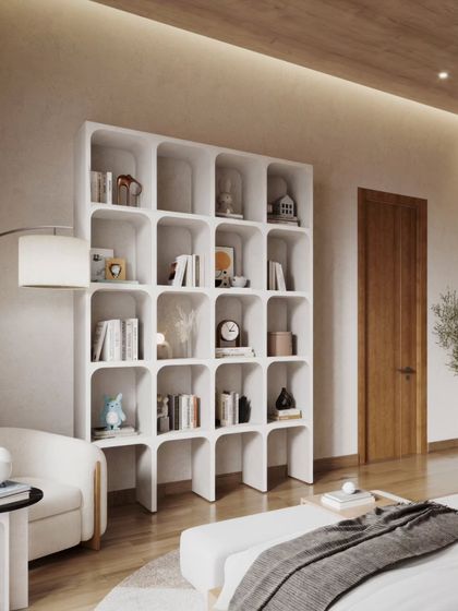 This bedroom project features a warm, minimalist design with natural wood tones and a focus on functionality. The renders highlight the clean lines of the furniture, a stylish bookshelf, and a calm, uncluttered aesthetic.