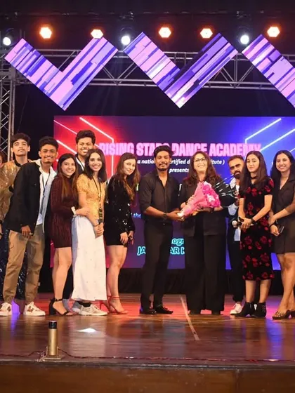 A group photo with Geeta Kapur and the entire team after a successful annual dance show. Teamwork makes the dream work.