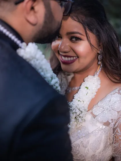 A close-up of this Christian bride's radiant smile and bold lip color.