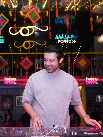 A smiling shot of me at the decks. I love the colorful and vibrant atmosphere of my Thursday night residency.