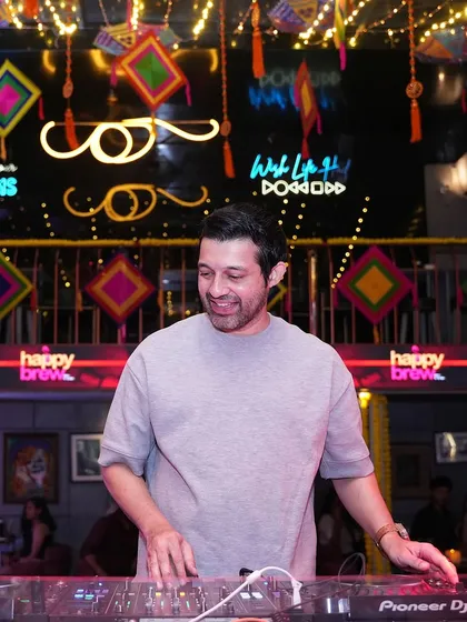 A smiling shot of me at the decks. I love the colorful and vibrant atmosphere of my Thursday night residency.