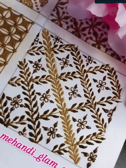 This grid combines leafy vines and small flowers for a very intricate and delicate look.