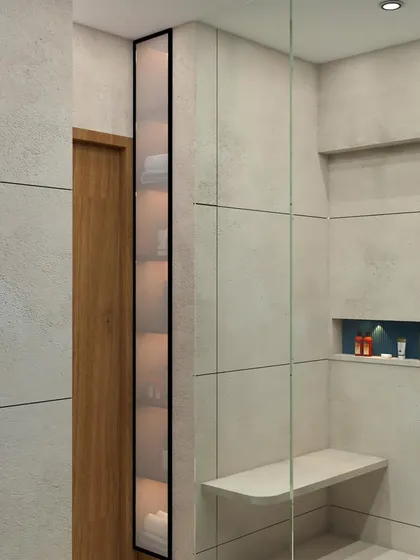 Another bathroom concept, this one with a more neutral and minimalist aesthetic. It includes a built-in shower bench and niche for storage, demonstrating our focus on practical and user-friendly design.