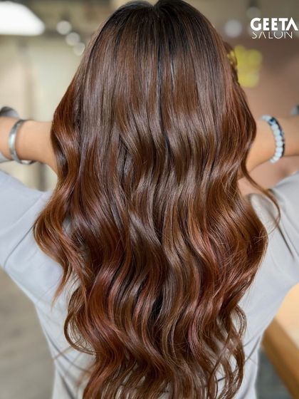 Another angle of a warm brown hair colour, showing how it shines from every direction.