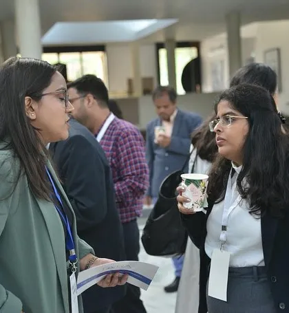 Discussing ideas at the IFCCI CSR Connect Seminar at the French Embassy. It's important to stay informed about Corporate Social Responsibility and ESG standards.