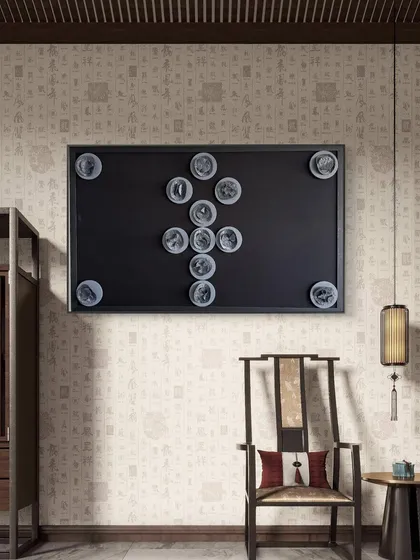 The 'Ankh' symbol from the Cutting Edge series, styled in a room with traditional East Asian influences. The piece bridges ancient meaning with timeless design.