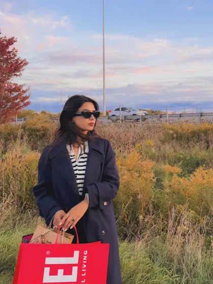 A close-up portrait from the fall shopping trip, highlighting my sunglasses and the warm light.