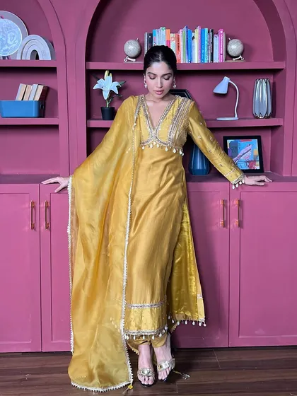 For her birthday, I styled Bhumi Pednekar in this vibrant yellow salwar suit. The intricate silver embroidery on the neckline and the flowing dupatta make it a cheerful and celebratory outfit.