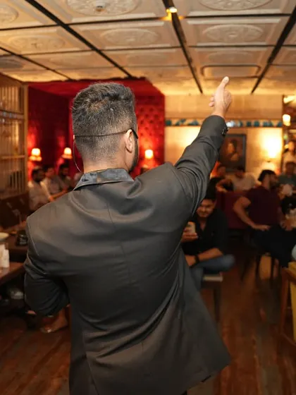 A view from the back as I address the full house at a Teacher's EOD event. The intimate setting of a lounge or bar is perfect for my interactive style.