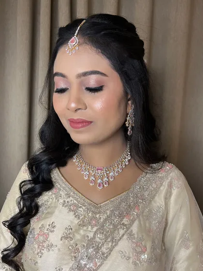 A change of jewellery, showing the versatility of the makeup.