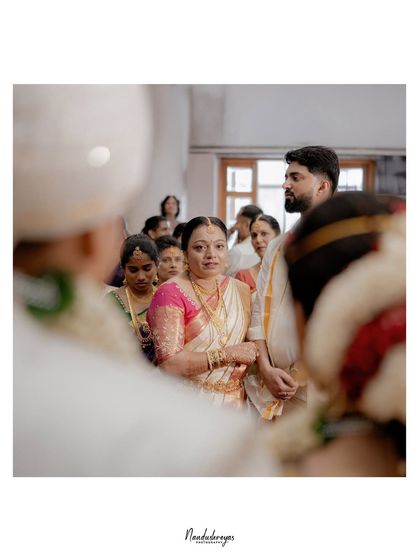 A mother's emotional gaze during her child's wedding ceremony. I believe in capturing the stories of everyone present, especially the heartfelt reactions of family.