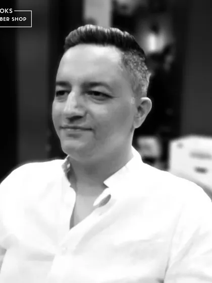 The final result: a happy client with a haircut that is both stylish and easy to manage.