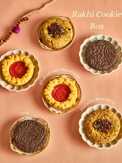 Our special Rakhi Cookie Box, featuring an assortment of flavors like Rhubarb Jam Shortbread, Pistachio Rose Berry, and our take on an Oreo.