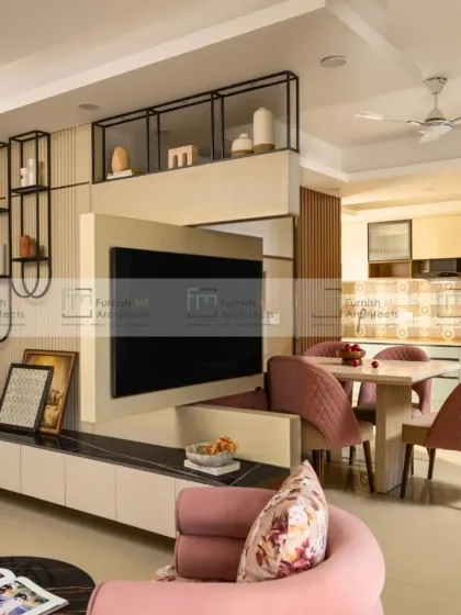 The TV unit mid-rotation, demonstrating its flexibility. This feature allows the screen to be viewed from the adjacent dining area, maximizing the utility of the space.