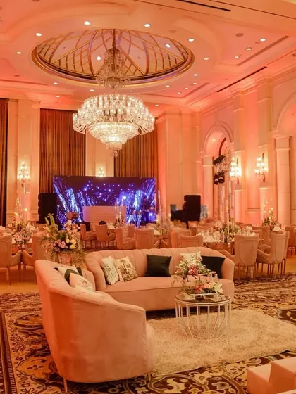 Transforming a grand ballroom requires a vision for both scale and intimacy. I used a soft blush palette, crystal chandeliers, and thoughtfully arranged lounge and dining areas to create an atmosphere of sophisticated, warm elegance for this ring ceremony.