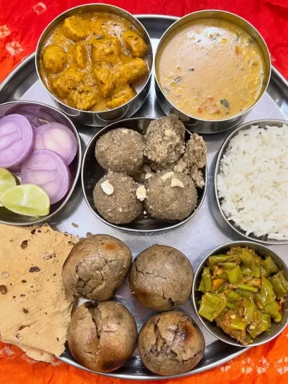 The heart of our service is the authentic Rajasthani Thali. This plate features our signature Dal, Bati, and Churma, made with traditional recipes and pure ingredients for a taste of true Rajasthani heritage.